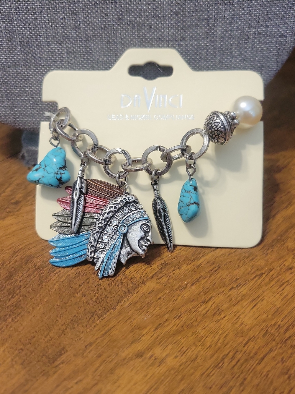 452- DaVinci Silver-Tone Charm Bracelet with Turquoise and Red Accents